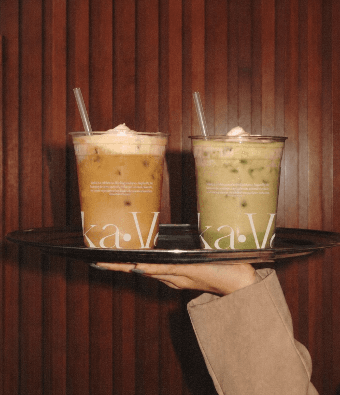 Two Vonka iced drinks carried on a tray.